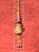 Thaise auto hanger met kalebas amulet met yantra inscripties